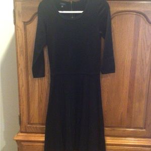 Gorgeous Black knit dress. Below knee. Soft pleated skirt.